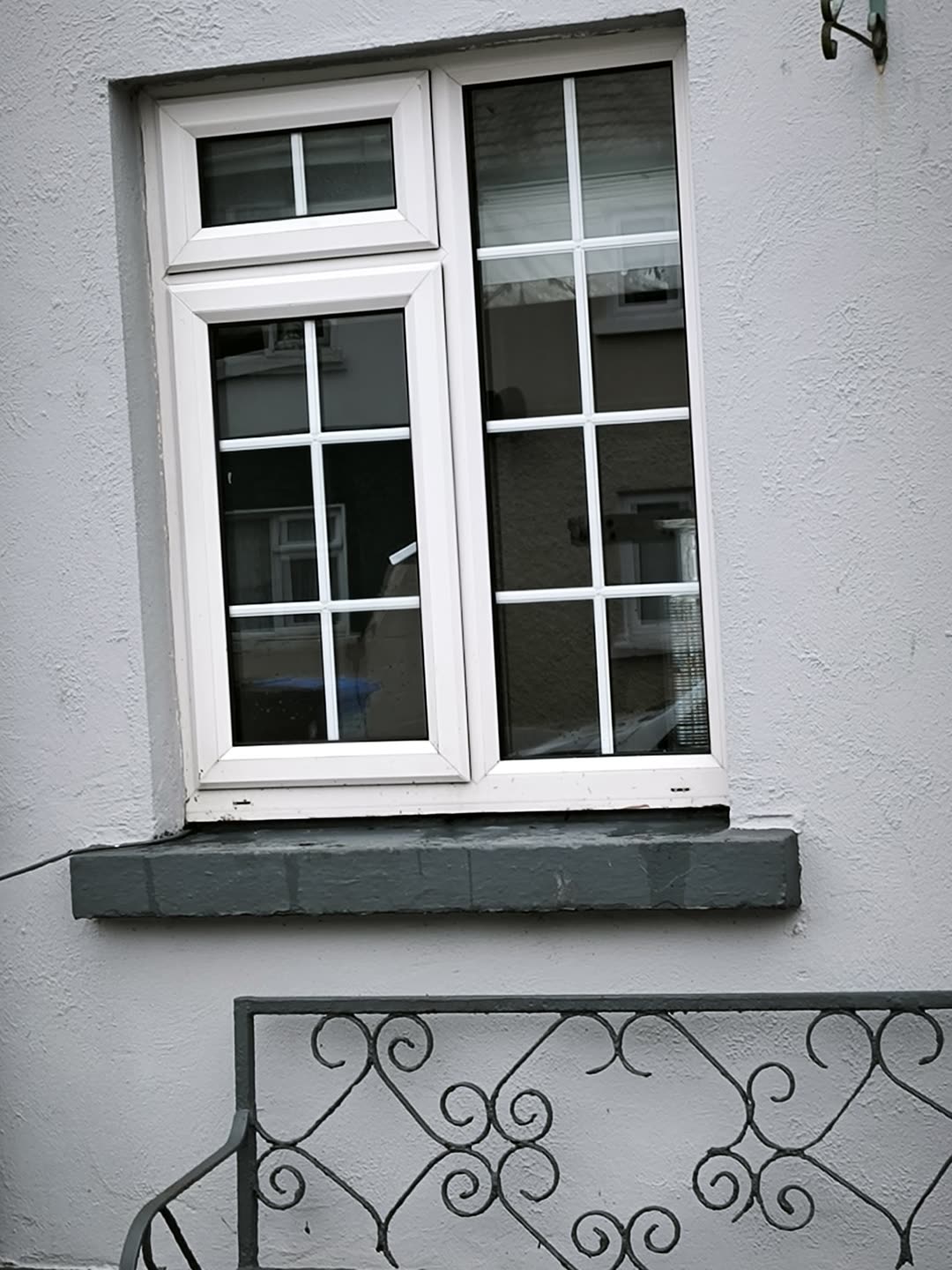 A clean white window with sparkling glass after a pure water clean in Kilkenny